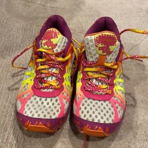 Woman’s ASICS gel noosa tri. Swim, bike, run.